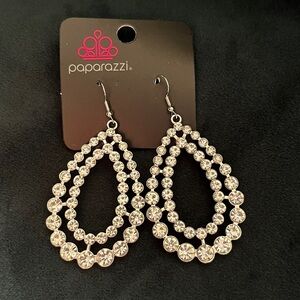 Fish hook earring. Silver/white gemstones.